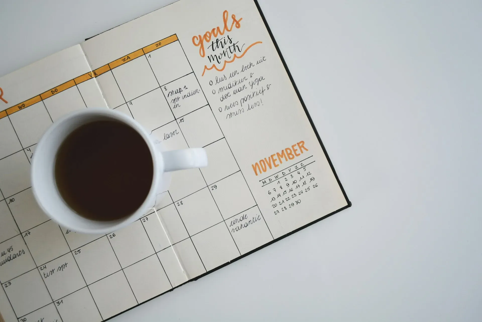 A desk calendar with dates circled and a stethoscope beside it, representing a regular STI testing schedule.
