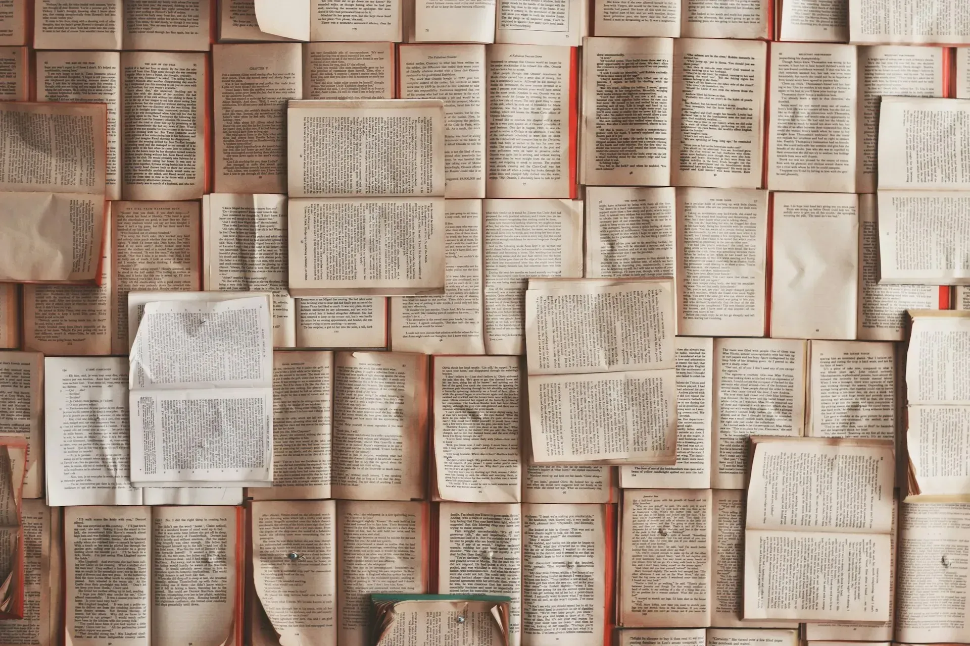 An open book resting on a wooden table in warm light, representing adults returning to learn the sex education they never received.